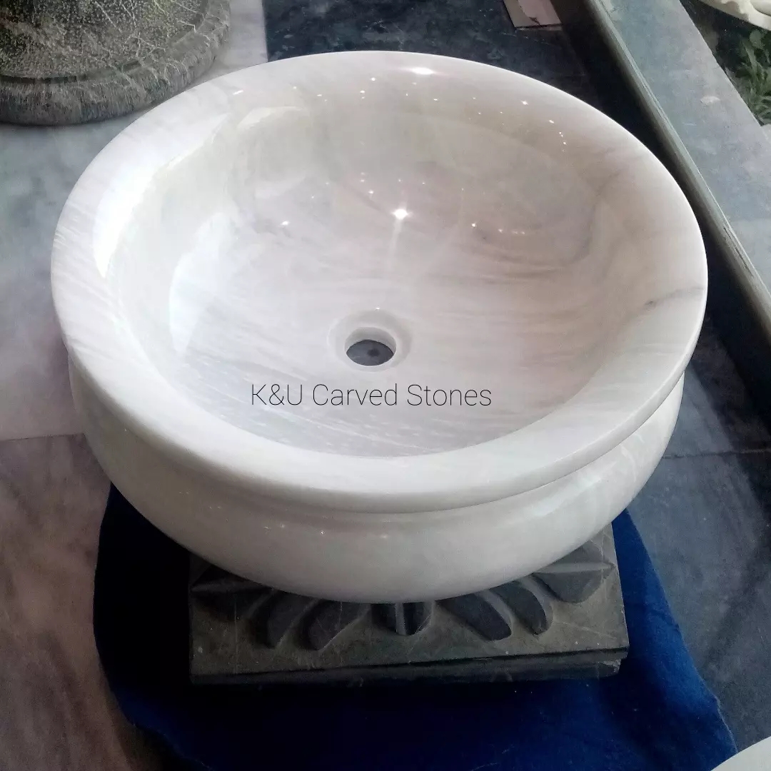 Round marble sink for minimalist vanity