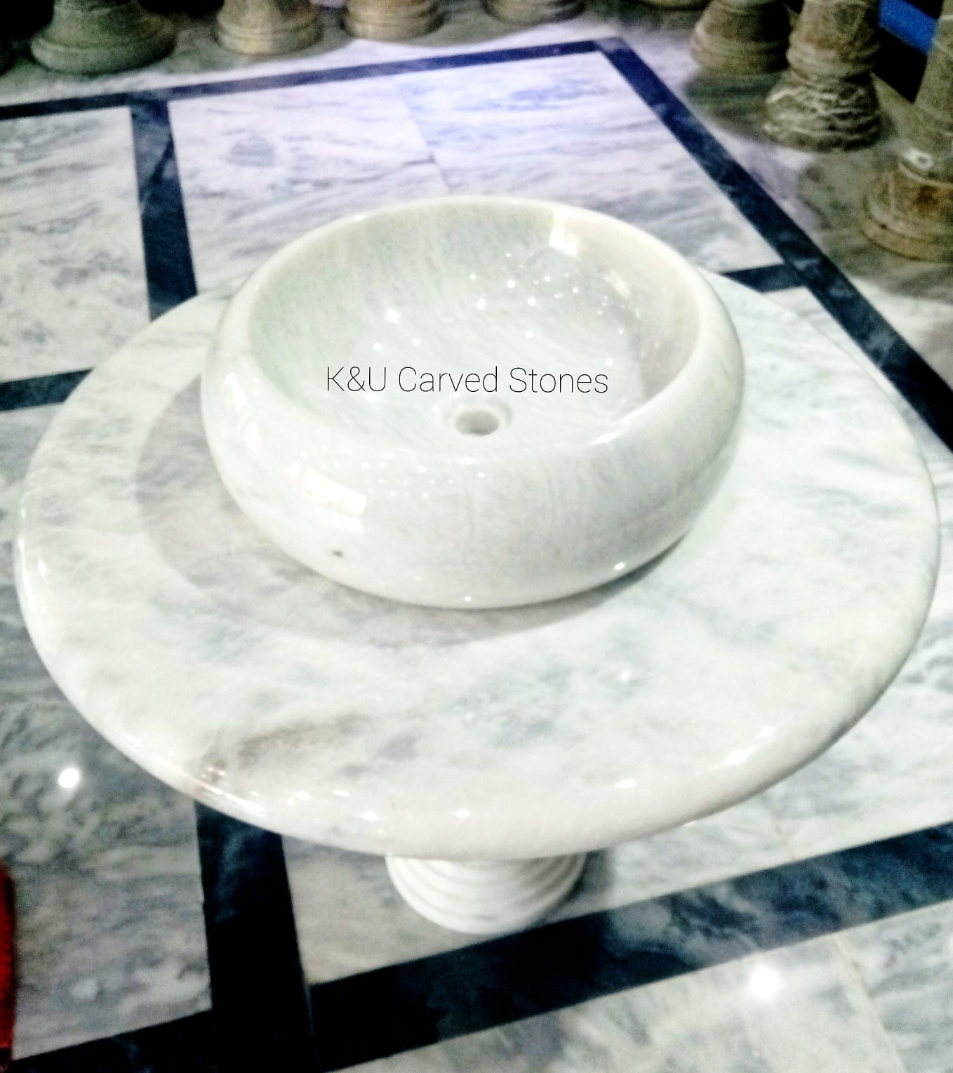 Designer marble vessel sink for contemporary interiors